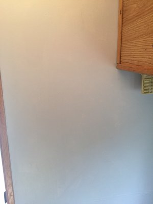Finished wall, other side.  I think the wall paper is covered nicely.
