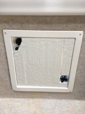 Wedged in place with notches to clear controls