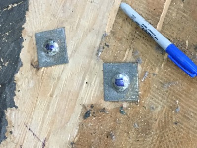 Mark the bolts with paint or a Sharpie