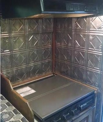 Tin oven backsplash