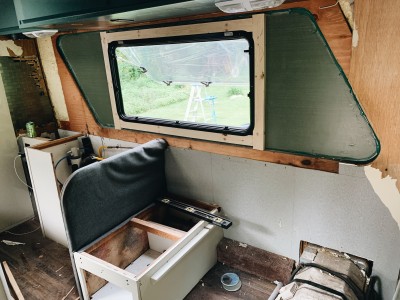 Concourse-stripped-on-driver-side_new-square-top-opening-window-w-new-fiberglass.jpeg